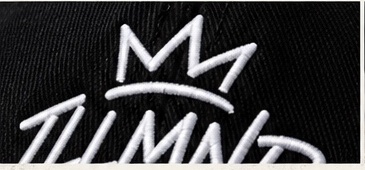 Close-up of the raised ILLMND crown embroidery